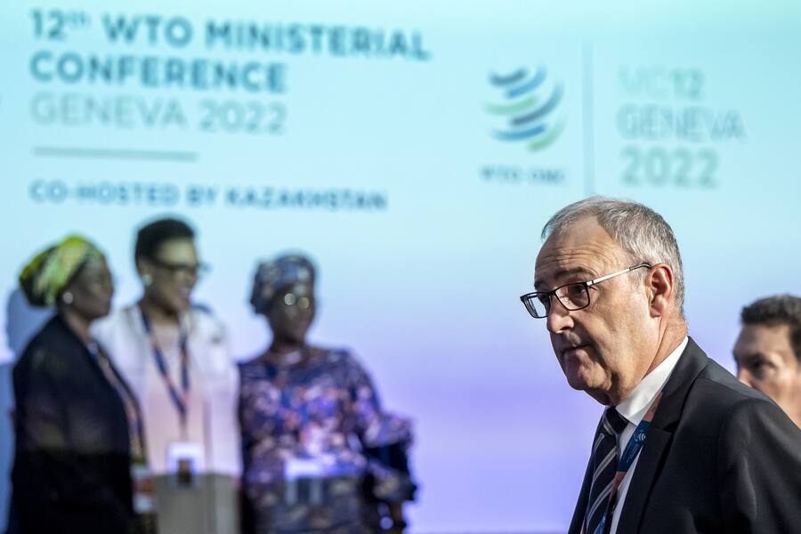 Switzerland's Guy Parmelin, Federal councillor for economic affairs, wait for the start at the opening ceremony of the 12th Ministerial Conference (MC12) taking place from June 12-15, in Geneva, at the headquarters of the World Trade Organization (WTO), in Geneva, Switzerland, Sunday, June 12, 2022. (KEYSTONE/POOL/Martial Trezzini).
