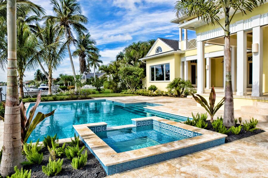 Beautiful swimming pool and spa at an estate home in Florida.