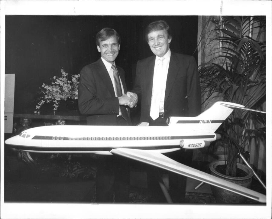 Donald Trump poses with Frank Lorenzo, owner of Eastern Air Lines Shuttle, and a model of the Trump jetliner. October 12, 1988. (Photo by Michael Schwartz/New York Post Archives /(c) NYP Holdings, Inc. via Getty Images)