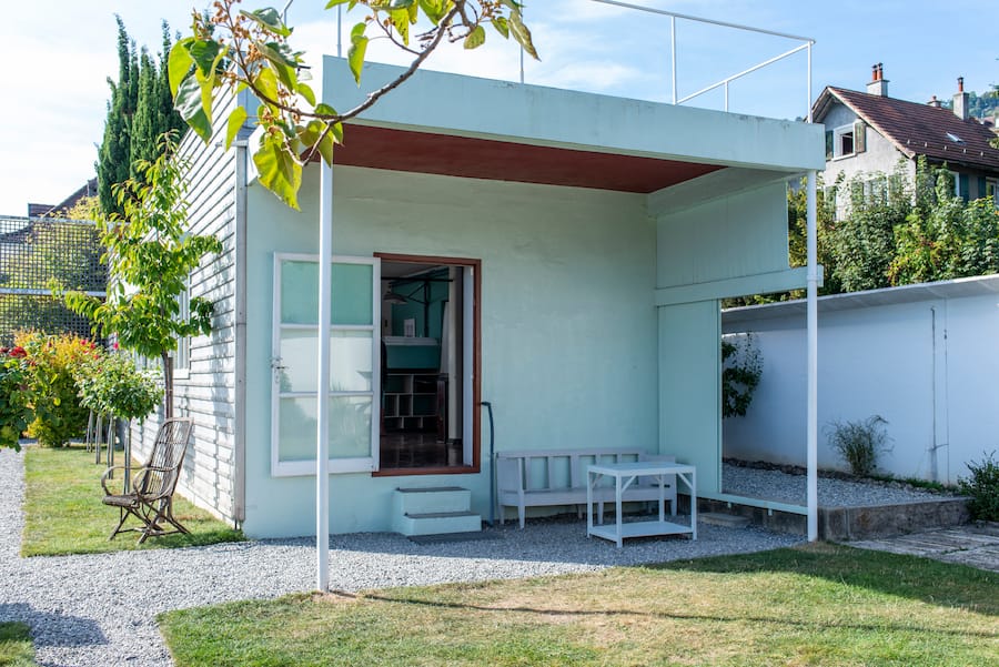View of exterior showing piloti. Villa Le Lac, Corseaux, Switzerland. Architect: Le Corbusier & Pierre Jeanneret, 1924. Villa Le Lac, Corseaux, Switzerland. Architect: Le Corbusier & Pierre Jeanneret, 1924.. (KEYSTONE/VIEW/Grant Smith)