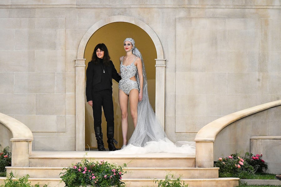 PARIS, FRANCE - JANUARY 22: Fashion designer Virginie Viard and Vittoria Ceretti walk the runway during the Chanel Haute Couture Spring Summer 2019 fashion show as part of Paris Fashion Week on January 22, 2019 in Paris, France. (Photo by SAVIKO/Gamma-Rapho via Getty Images)