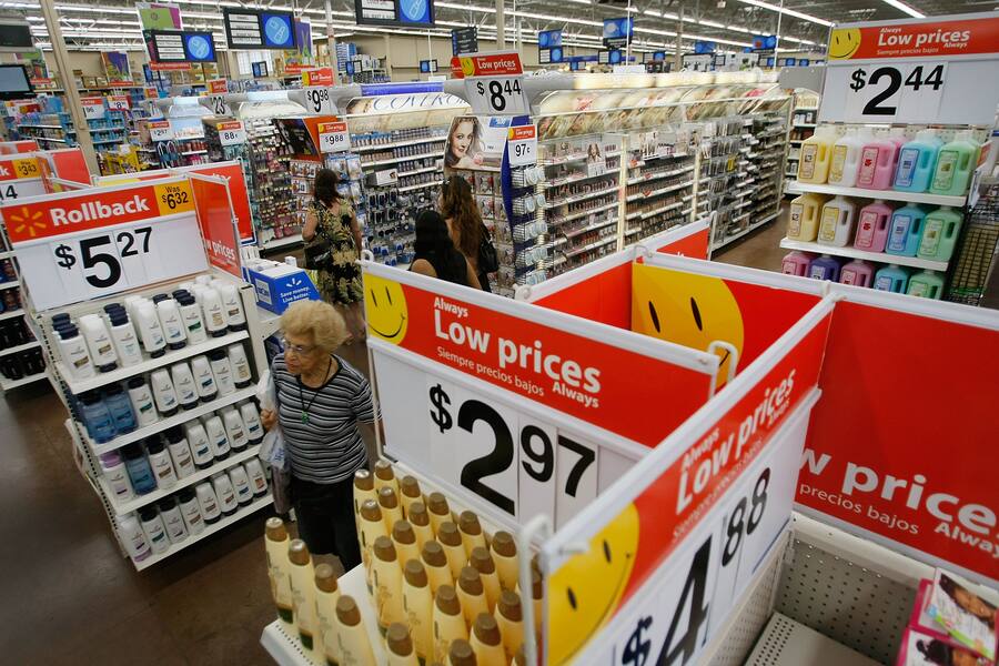 NORTH MIAMI, FL - AUGUST 14: People shop at a Wal-Mart Store August 14, 2008 in North Miami, Florida. The company reported its second-quarter profit rose 17% and it raised its full-year forecast. (Photo by Joe Raedle/Getty Images)